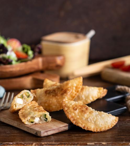 Empanadas con feta e zucchine PIATTO PRINCIPALE